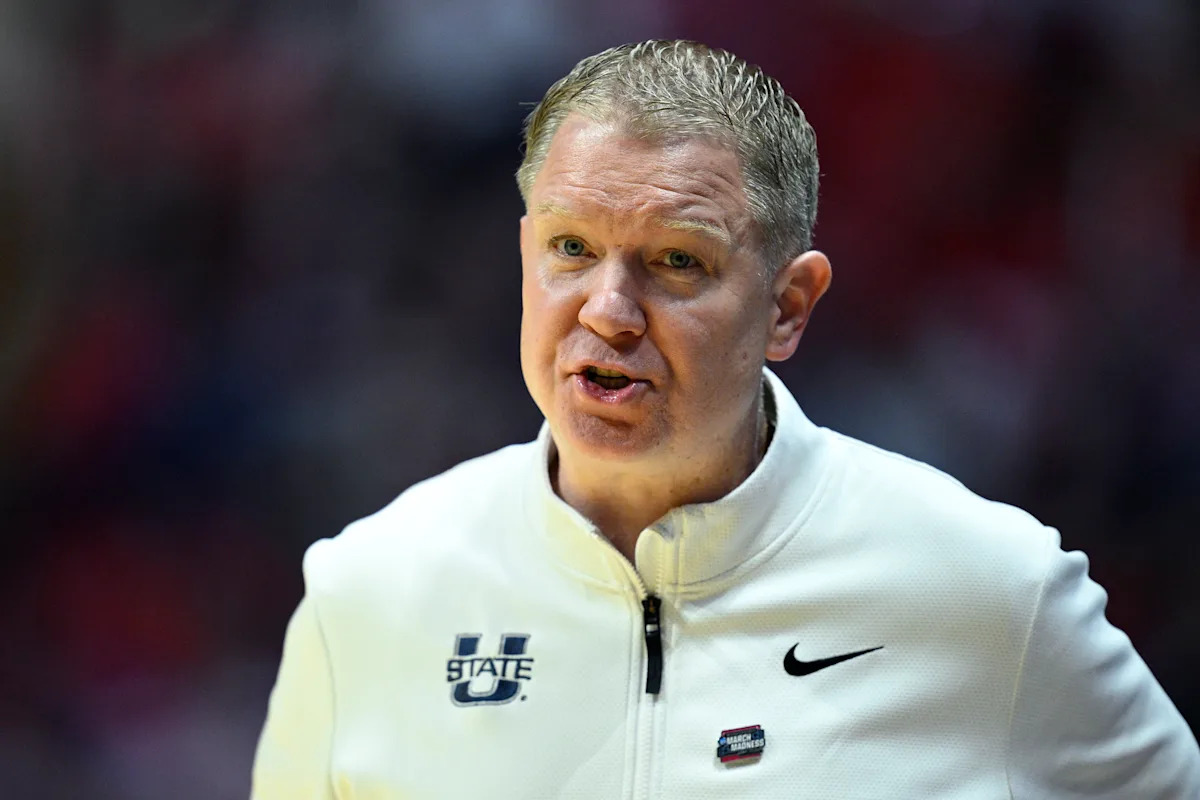 Cincinnati hiring Jerrod Calhoun from Utah State as men's Hoops action coach, per reports reported globally